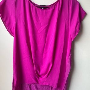 INC blouse, shorter in the front with detailed. Size M